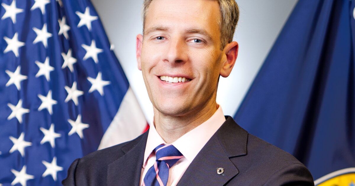 Comptroller Jonathan Gould before United States and OCC flags